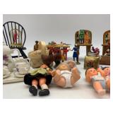 Collection of Vintage Miniature Dolls and Toy Tea Set with Floral Design