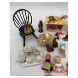 Collection of Vintage Miniature Dolls and Toy Tea Set with Floral Design