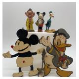 Collection of Vintage Disney Figurines and Wall Plaques featuring Mickey Mouse and Donald Duck