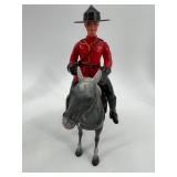 Collection of Royal Canadian Mounted Police Figurines and Horse