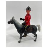 Collection of Royal Canadian Mounted Police Figurines and Horse