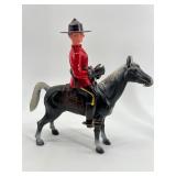 Collection of Royal Canadian Mounted Police Figurines and Horse
