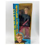 Collection of 5 Pop Star Dolls Including Justin Bieber, Aaron Carter, and S Club 7