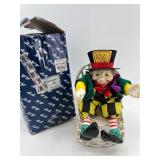 Alice in Wonderland Collectibles: Mad Hatter Figurine, Fitz and Floyd Plate, and Tea Set