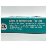 Alice in Wonderland Collectibles: Mad Hatter Figurine, Fitz and Floyd Plate, and Tea Set