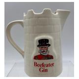 Collection of Ceramic Beefeater Gin Jug and Royal Doulton Figurines