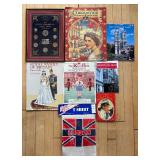 Collection of British Royalty Memorabilia Featuring Coins, Books, and T-Shirt