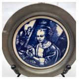 Collection of Vintage Memorabilia Including Plates, Photos, and Souvenirs