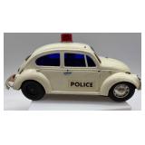 Vintage Toy Police Car with New Zealand House Tile Art