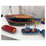 Collection of 13 Handcrafted Model Boats and Ships with Unique Designs