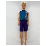 Set of 4 Collectible Ken Dolls in Various Attires