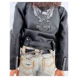 Collection of 4 Vintage Ken Dolls with Varied Outfits including Harley Davidson