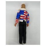 Collection of 4 Vintage Ken Dolls with Varied Outfits including Harley Davidson