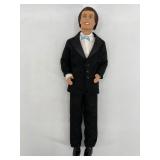 Collection of 4 Vintage Ken Dolls with Varied Outfits including Harley Davidson