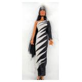 Vintage Cher Barbie Doll in Striking Outfit with Feathered Headpiece