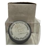 1980 LAKE PLACID OLYMPICS HOCKEY PUCK // SIGNED BY USA CAPTAIN MIKE ERUZIOE