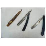 Vintage razors in wood holder