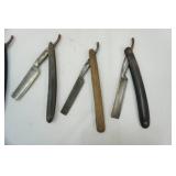 Vintage razors in wood holder