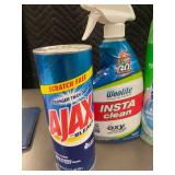 Collection of Cleaning Products Including Ajax, Lysol, and Scrubbing Bubbles