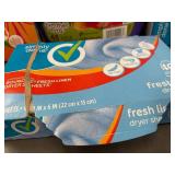Assorted Laundry Care Products Including Detergent and Dryer Sheets
