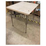 Used  Table with Metal Legs