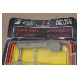 Assorted Tools -Multi-Purpose Cutter Tool, Pillow, EFCO Sharpener, Hex Drive Sockets, Makita Saw