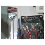 Lot of assorted wrenches and pliers...
