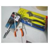 Assortment of hand tools and Flores...