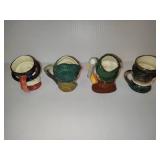 Four Royal Doulton Small Mugs
