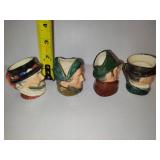 Four Royal Doulton Small Mugs