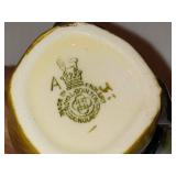 Four Royal Doulton Small Mugs