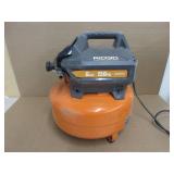 RIDGID 6 Gal. Portable Electric Pancake Air Compressor - Slight Crack in Plastic By Gauges, Holds Air, USED, WORKS!