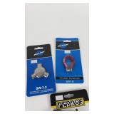 Collection of Bicycle Maintenance Tools Including Park Tool Wrenches and Brushes