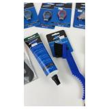 Collection of Bicycle Maintenance Tools Including Park Tool Wrenches and Brushes