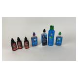 Collection of Bicycle Chain Lubricants and Superior Lubricant Bottles