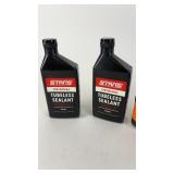 Collection of Stans Tubeless Sealant and Orange Seal Endurance Sealant Bottles