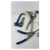 Collection of Bicycle Tools including Pliers and Wrenches