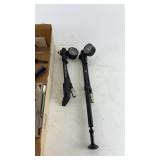 Collection of Bicycle Repair Tools with Tire Gauges and Accessories