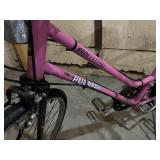 Pair of Vintage Bicycles: Huffy Pink 15-Speed and NordicTrack Teal Speed Bike