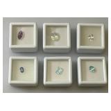 Misc. (Lab Created) Gems (In Protective Sleeves) Including 1.1Ct Pink Amethyst, 1.14 CT Blue Zircon, 1.17 Ct. Sky Blue Topaz, 1.5 CT White Topaz, 2.09 CT Blue Kyadite & More