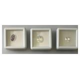 Misc. (Lab Created) Gems (In Protective Sleeves) Including 1.1Ct Pink Amethyst, 1.14 CT Blue Zircon, 1.17 Ct. Sky Blue Topaz, 1.5 CT White Topaz, 2.09 CT Blue Kyadite & More