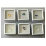 Misc. (Lab Created) Gems (In Protective Sleeves) Including 1.1Ct Pink Amethyst, 1.14 CT Blue Zircon, 1.17 Ct. Sky Blue Topaz, 1.5 CT White Topaz, 2.09 CT Blue Kyadite & More