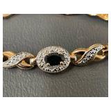 Elegant Gold Over Sterling SIlver Bracelet with Black Oval Stones