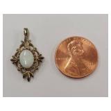 Opal Pendant in Decorative Sterling Silver Setting