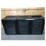 Lot of 3 - Sanus 34" Steel Cases on Casters with Stereo Mixers and a Cracked Samsung 49" Monitor