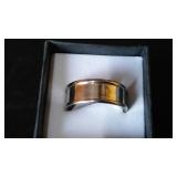 Silver Colored Ring Band.