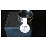 Silver Colored Ring Band.