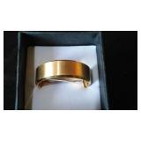 Gold Colored Ring Band.