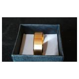 Gold Colored Ring Band.