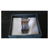 Silver Colored Ring Band with Wave Design.